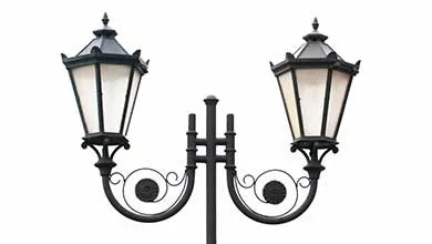 Black double lamppost with ornate scrollwork, shown on a white background.