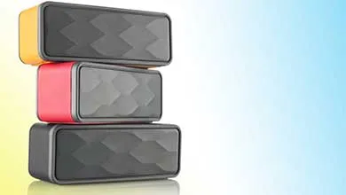 Three stacked rectangular devices with textured black fronts and colored side panels arranged vertically against a light gradient background, illustrating vibration‑damping performance.